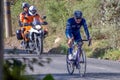 A man rides a bicycle followed by a bike Royalty Free Stock Photo