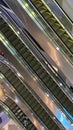 Man rides almost empty escalators shopping in mall in Cambodia