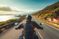 A man rides a motorcycle along a scenic coastal road with the ocean in the background, A biker enjoying a solitary ride on a