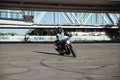 Man rides a motorcycle in the city.Motorcyclist riding a bike during the day on the road