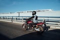 Man rides a motorcycle in the city.Motorcyclist riding a bike during the day on the road