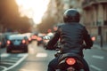 A man rides a motorcycle in city traffic, View from the back, Close-up