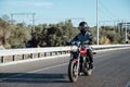 Man rides a motorcycle in the city.Motorcyclist riding a bike during the day on the road