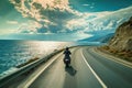 A man rides a motorcycle down a road next to the ocean, A biker enjoying a solitary ride on a coastal highway, AI Generated