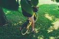 A man rides a yellow rented bike