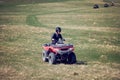 Man riding atv vehicle on off road track ,people outdoor sport activitiies theme Royalty Free Stock Photo