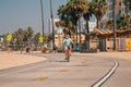 Man riding a beach bike near Venice beach in Los Angeles