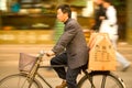 Man riding a bicycle in font of the markets of Yuyuan Gardens in Old Town Shanghai Royalty Free Stock Photo