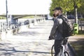 A man is riding a bicycle near the river Royalty Free Stock Photo