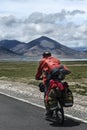 Man riding bicycle in Tibetan