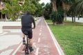 Man riding a bike along the bike path in the city Royalty Free Stock Photo