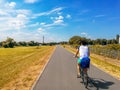 Man riding bike over bicycle line in Bon, Germany Royalty Free Stock Photo