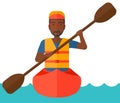 Man riding in canoe.