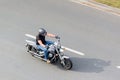 Man riding a chopper motorcycle with motion blur effect