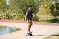 Man Riding an Electric Skateboard