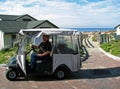 Man riding golf cart