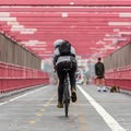 Man riding his bike in the cycling lane on Williamsburg Bridge, Brooklyn, New York City. Royalty Free Stock Photo