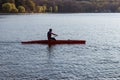 A man is riding a kayak