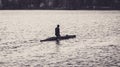 A man is riding a kayak