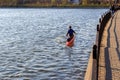 A man is riding a kayak