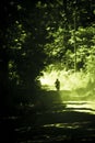 Man riding motorbike on rural unpaved road in Monteverde, Costa Rica