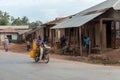 Man riding motorbike on Zanzibar village street