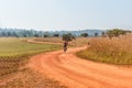 Man riding a mountain bike on a dirt road Royalty Free Stock Photo