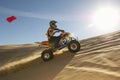 Man Riding Quad Bike In Desert Royalty Free Stock Photo