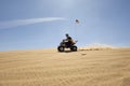 Man Riding Quad Bike In Desert Royalty Free Stock Photo