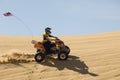 Man Riding Quad Bike In Desert Royalty Free Stock Photo