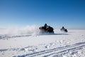 Man riding quad bike on snowy winter field Royalty Free Stock Photo