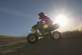 Man Riding Quadbike In Desert