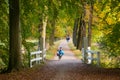 Man riding recumbent bicycle in autumn, Netherlands