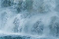 Man Riding Surfboard in Front of Waterfall Royalty Free Stock Photo