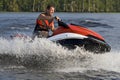 Man riding wave runner in river Royalty Free Stock Photo