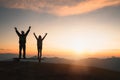 Man rise hand up on top of mountain and sunset, Freedom and travel adventure concept. Religious beliefs, Copy space