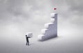 Man rising stairs to reach the top of the tower. Choice of solution for success. Business concept growth and the path to success.