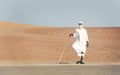 Man on the roadside in a desert
