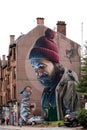 Man with a Robin On His Finger Mural High Street Glasgow. Modern Day Mungo