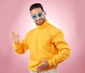 Man, robot dance and sunglasses in studio portrait with smile, moving or fashion for aesthetic by pink background. Asian Royalty Free Stock Photo