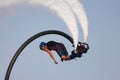 Man rocketing from the water on a flyboard