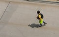 Man Rollerblades on boardwalk at Virginia Beach, VA