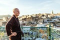 Man on the rooftop enjoying view of Fez old arabic medina, Morocco, Africa Royalty Free Stock Photo