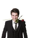 Man with a rose in his mouth Royalty Free Stock Photo