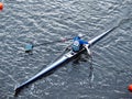 Man rowing in boat on water