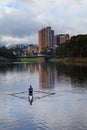 Man rowing on the River Torrens