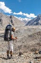 Man with rucksack in Kyrgyzstan