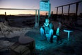 Man in Ruins Watching Television Royalty Free Stock Photo