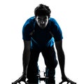 Man runner sprinter on starting blocks silhouette Royalty Free Stock Photo