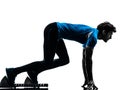 Man runner sprinter on starting blocks silhouette Royalty Free Stock Photo